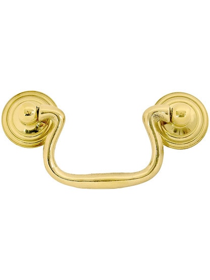 Swan-Neck Brass Bail Pull with Ringed Round Rosettes ‚Äì 2 ¬Ω‚Äù Center-to-Center in Unlacquered Brass Finish.